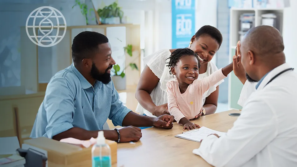 a family with a young girl high-fiving her doctor