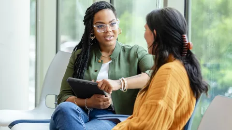 Genetic counselor with patient